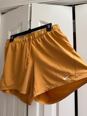 Nike Women's Golden Orange Athletic Shorts with Drawstring